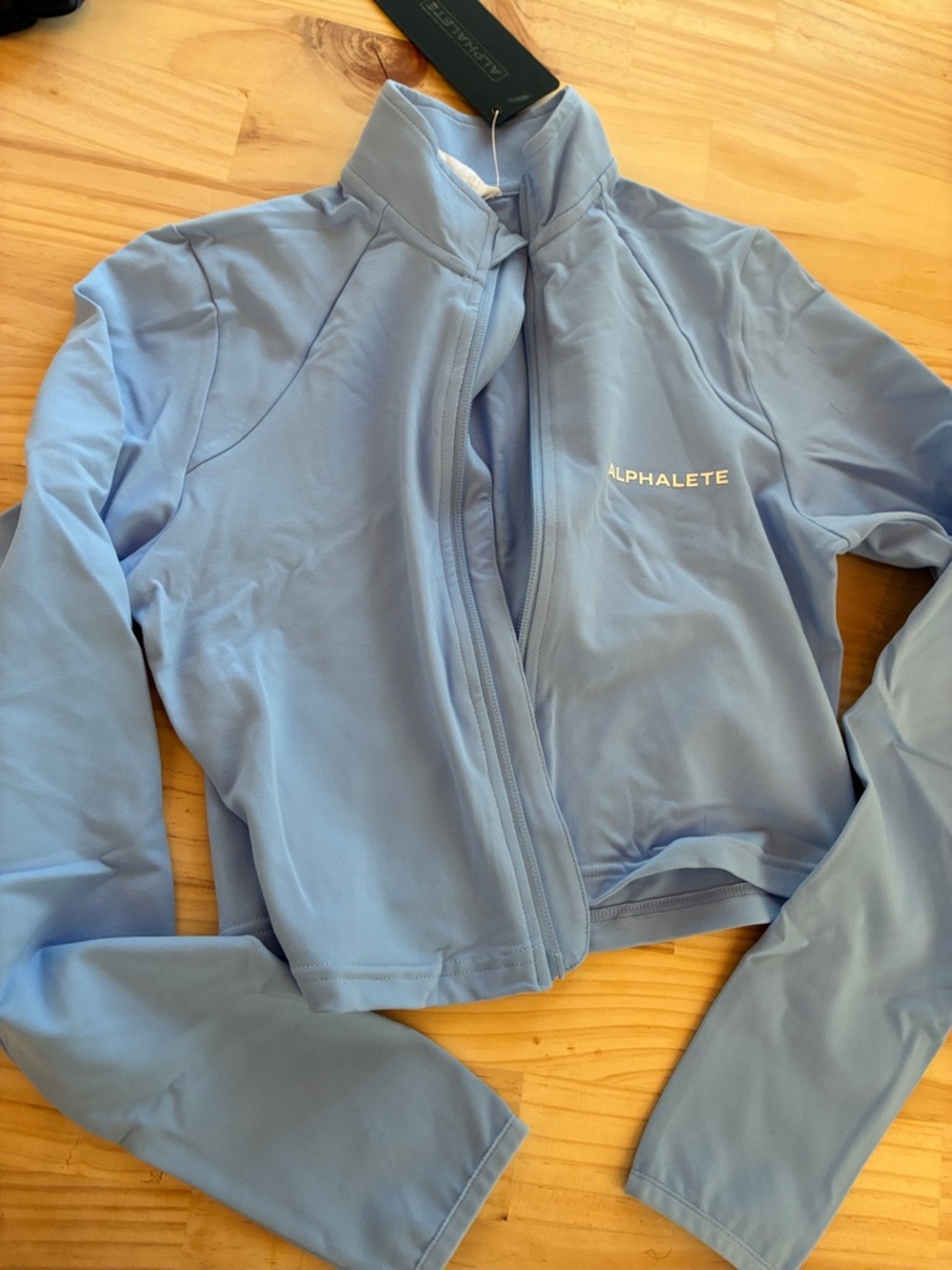 Alphalete Sky Blue Cropped Bomber Jacket